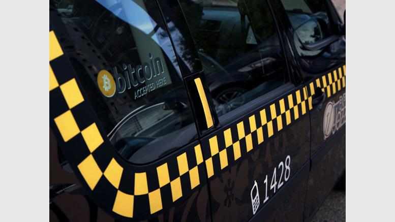 Taxi firms seek to drive bitcoin adoption