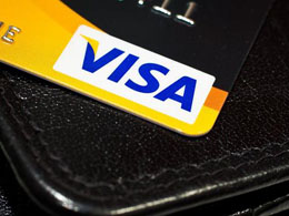 E-Coin Launches VISA-Branded Bitcoin Debit Card